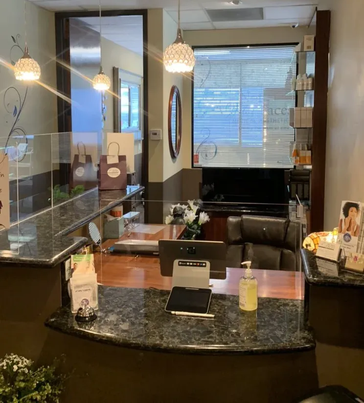 Clean, professional medical spa treatment room with neutral tones at Not Just Faces Medical Aesthetics in Laguna Niguel 