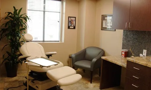 Clean, professional medical spa treatment room with neutral tones at Livingston Plastic Surgery in Houston