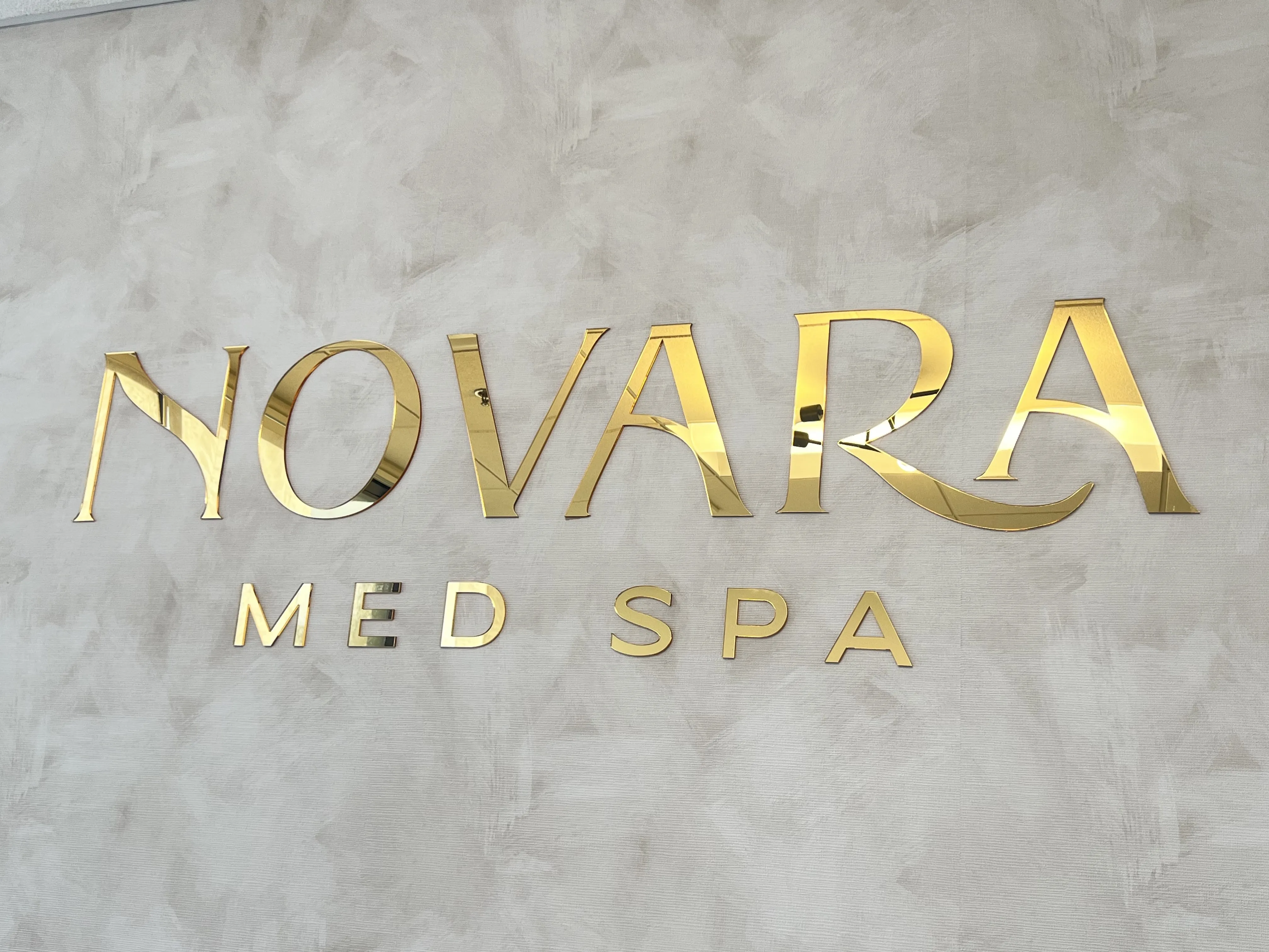 Clean, professional medical spa treatment room with neutral tones at Novara Med Spa in Gilbert
