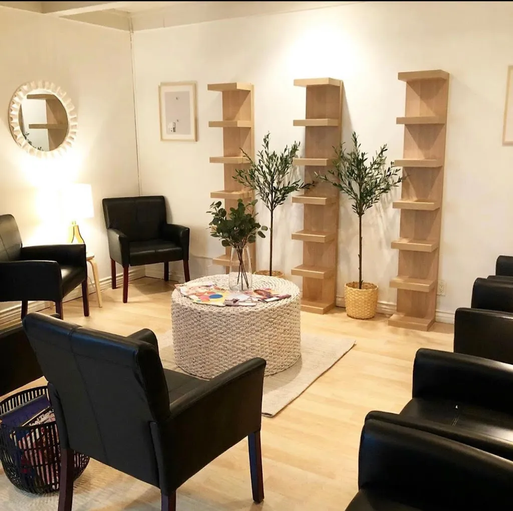 Clean, professional medical spa treatment room with neutral tones at OSVI -Tustin in Tustin