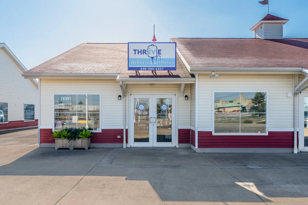 Clean, professional medical spa treatment room with neutral tones at Thrive Wellness and Aesthetics in Port Clinton