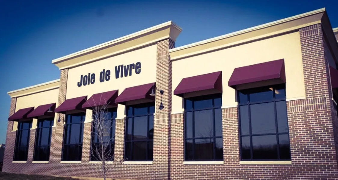 Clean, professional medical spa treatment room with neutral tones at Joie de Vivre Medical in Bloomington