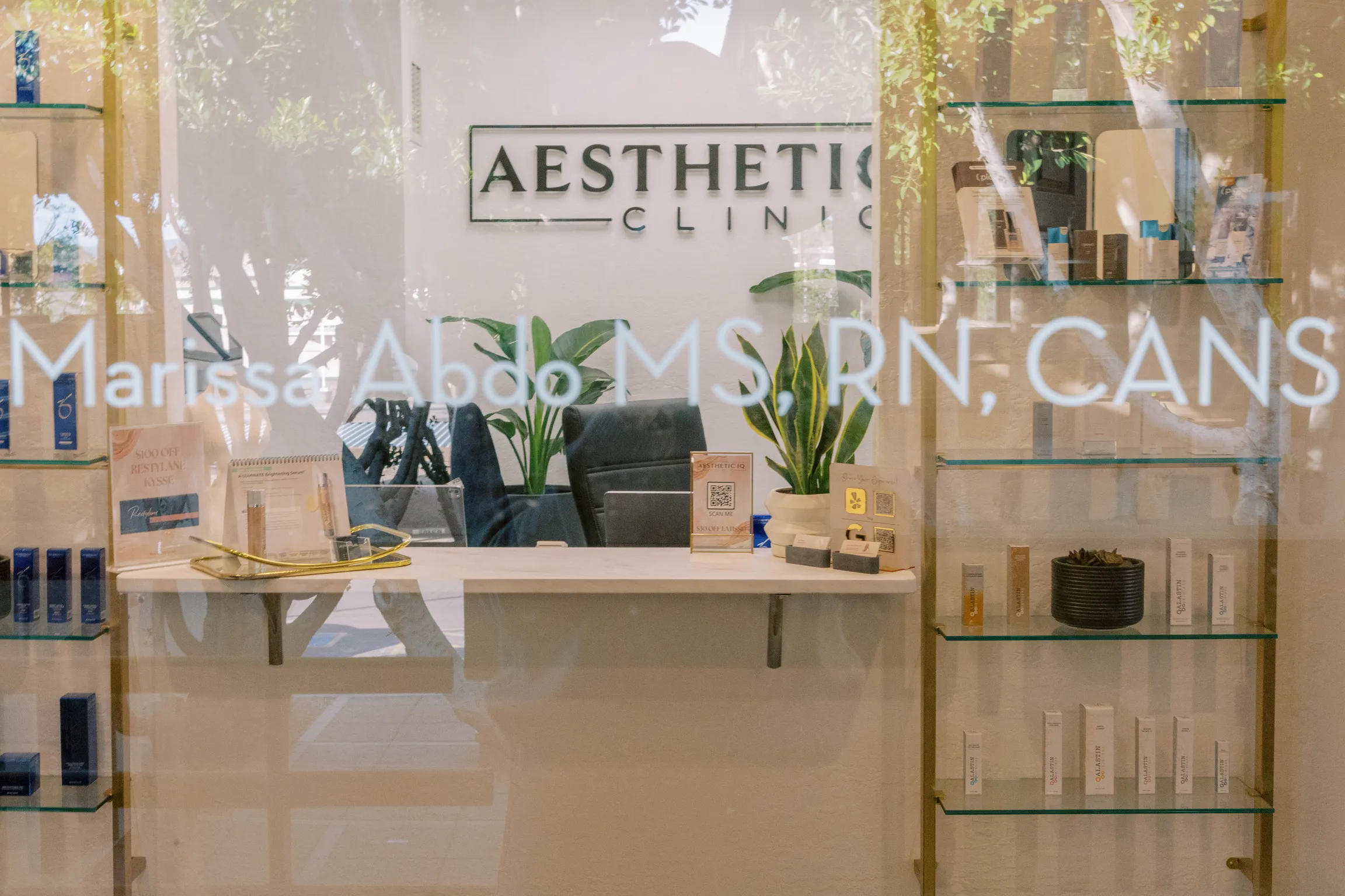Clean, professional medical spa treatment room with neutral tones at Aesthetic IQ Clinic in Scottsdale