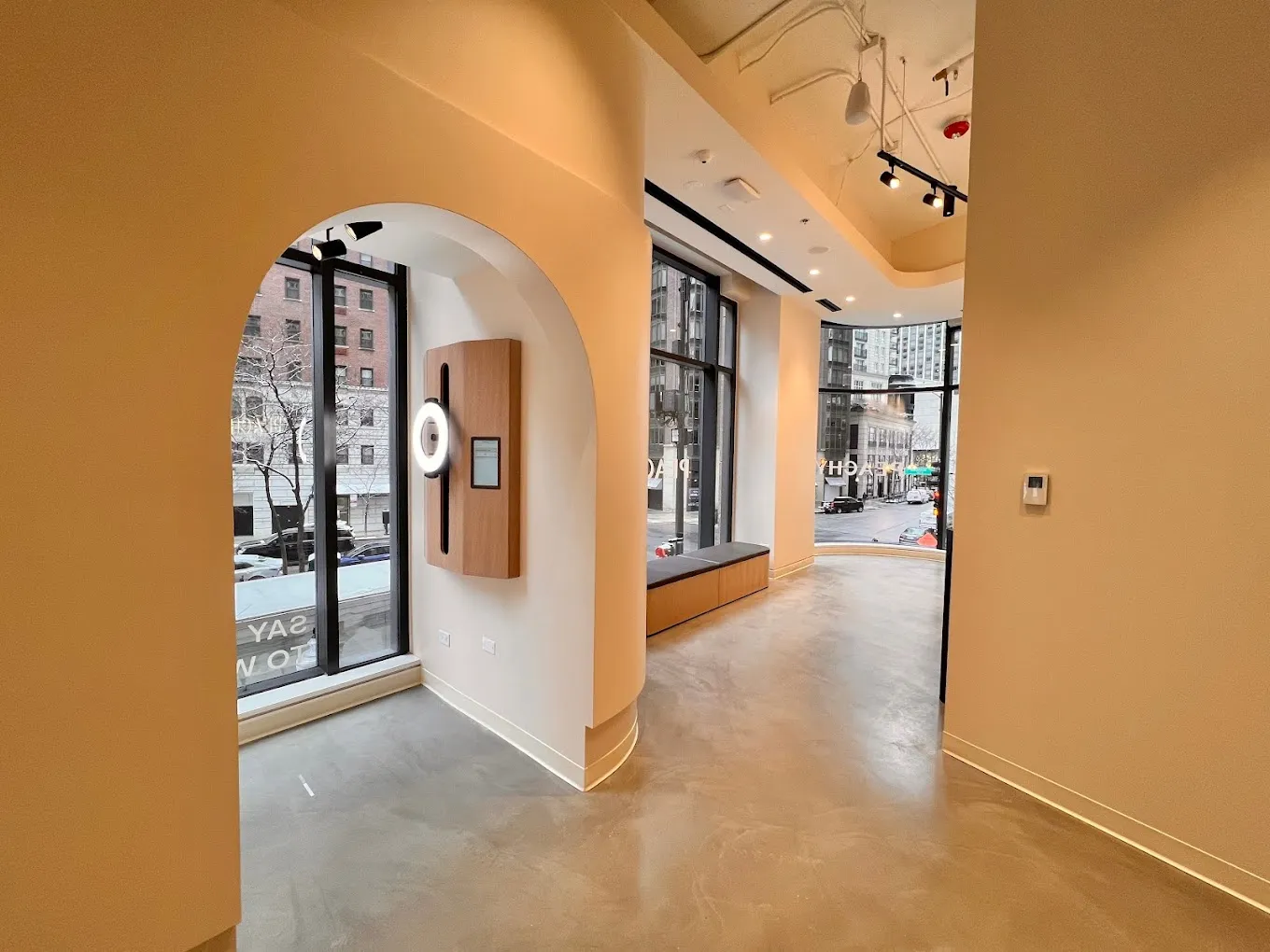 Clean, professional medical spa treatment room with neutral tones at PEACHY - Gold Coast in Chicago