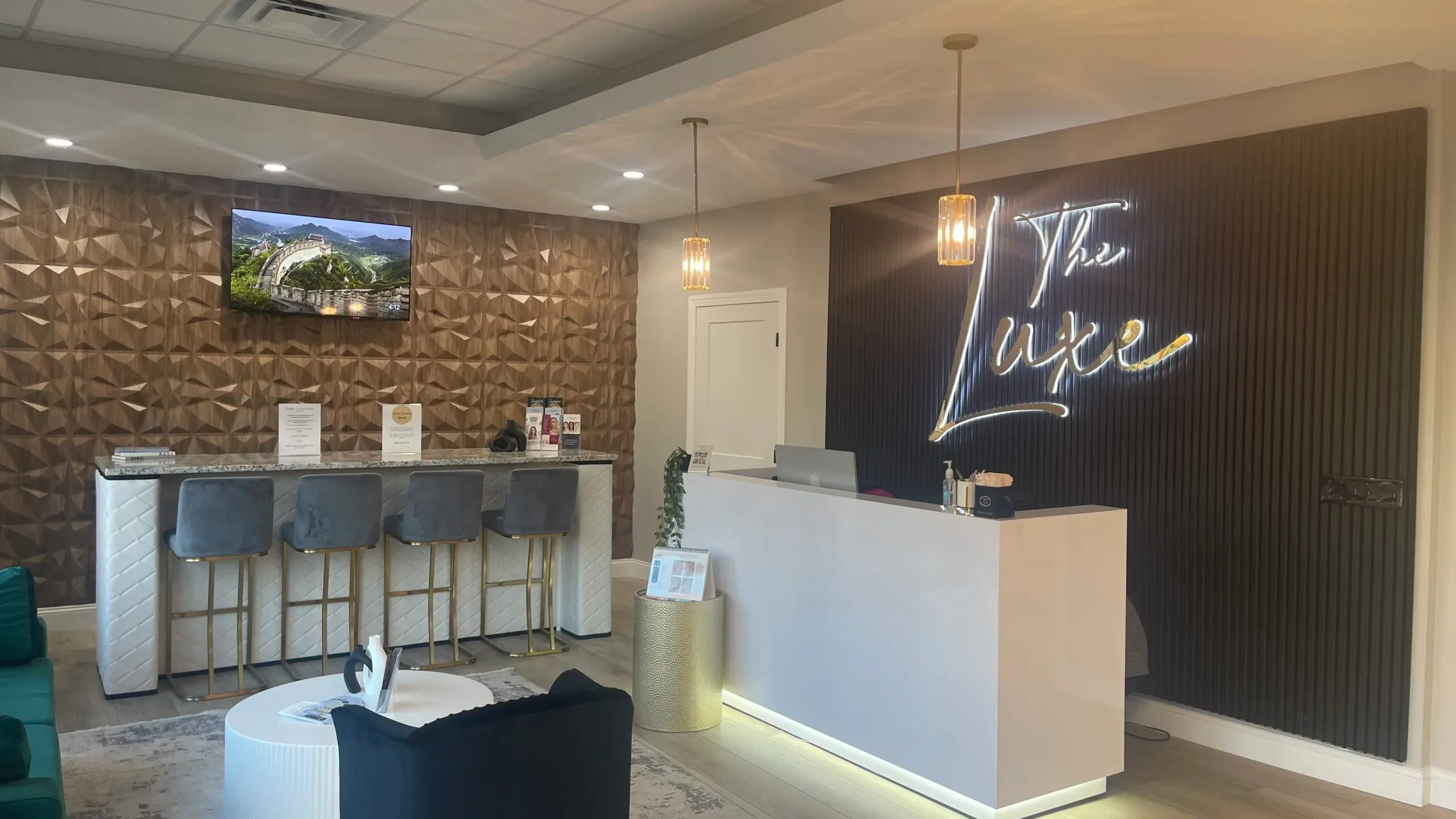 Clean, professional medical spa treatment room with neutral tones at The Luxe Upper Arlington in Columbus