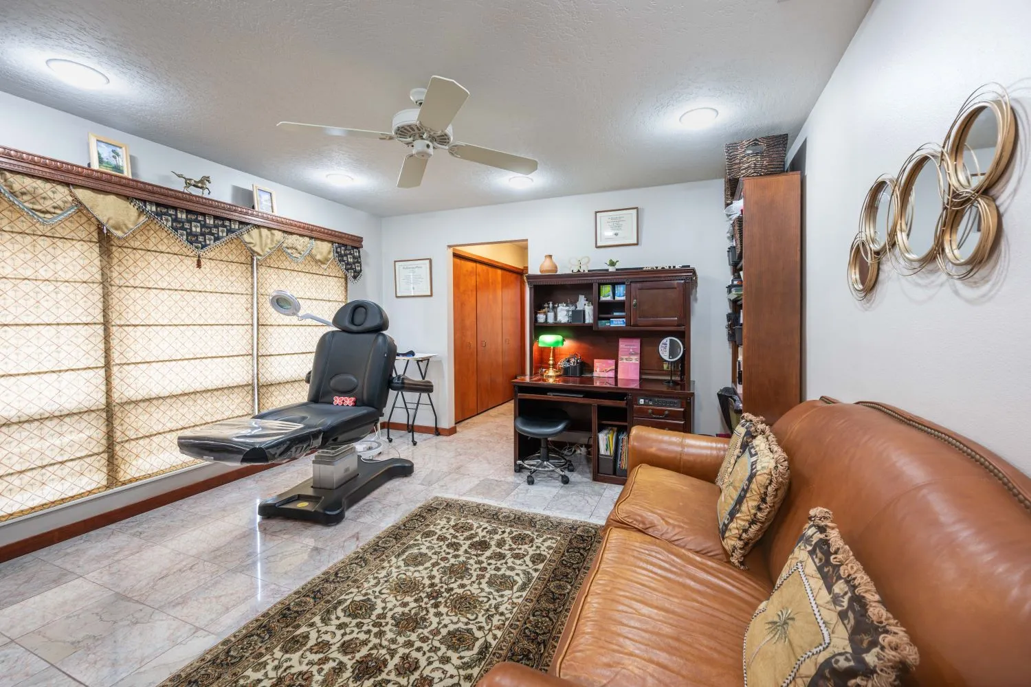 Clean, professional medical spa treatment room with neutral tones at Carolesthetics in Ocala