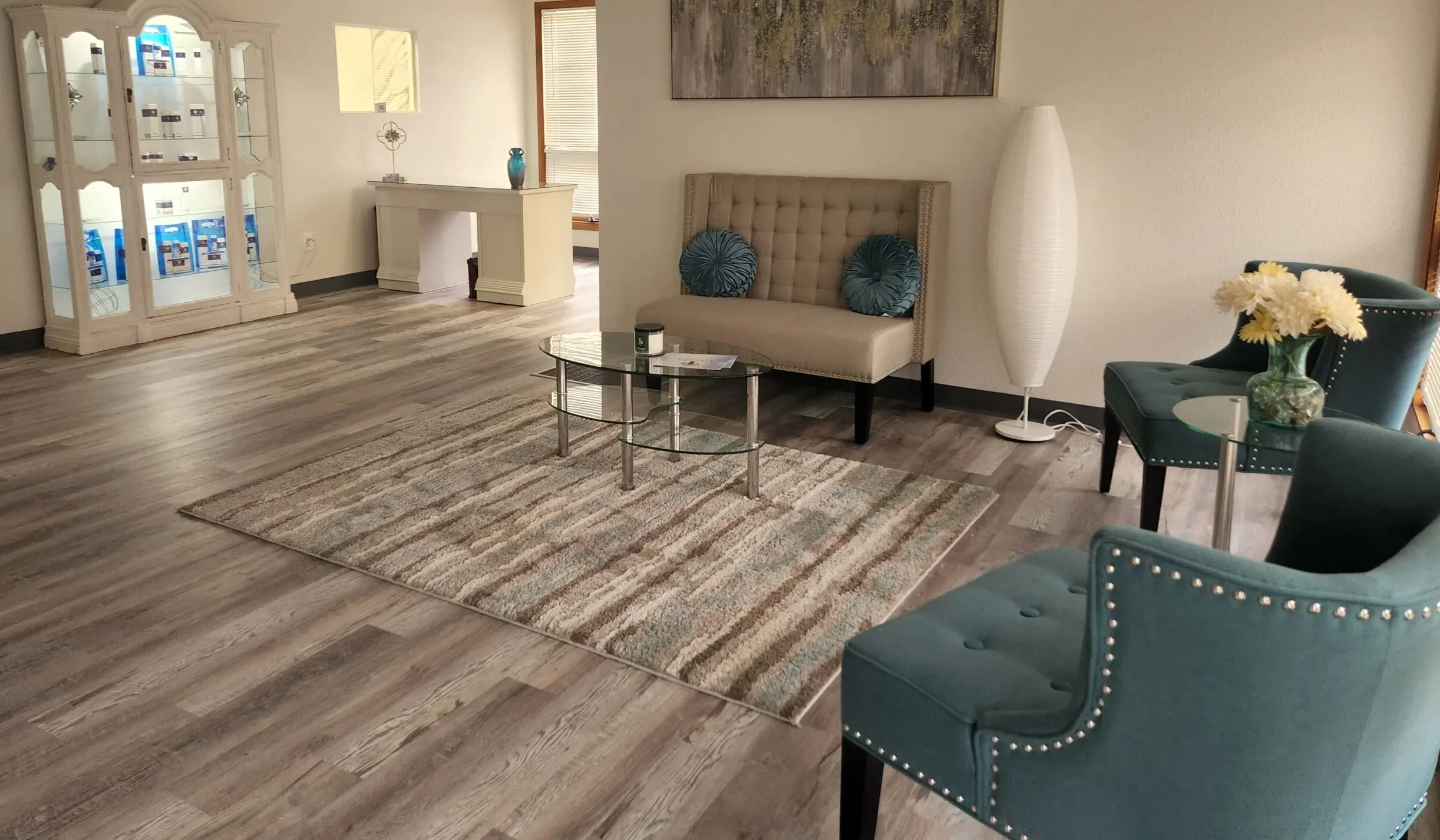 Clean, professional medical spa treatment room with neutral tones at 18 Spa in Loveland