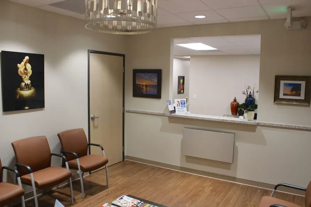 Clean, professional medical spa treatment room with neutral tones at Apex Dermatology in Westlake Village