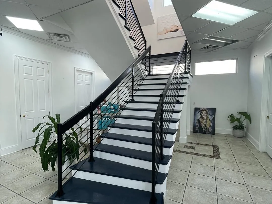 Clean, professional medical spa treatment room with neutral tones at Carmen and Santos Med Spa in Kenner
