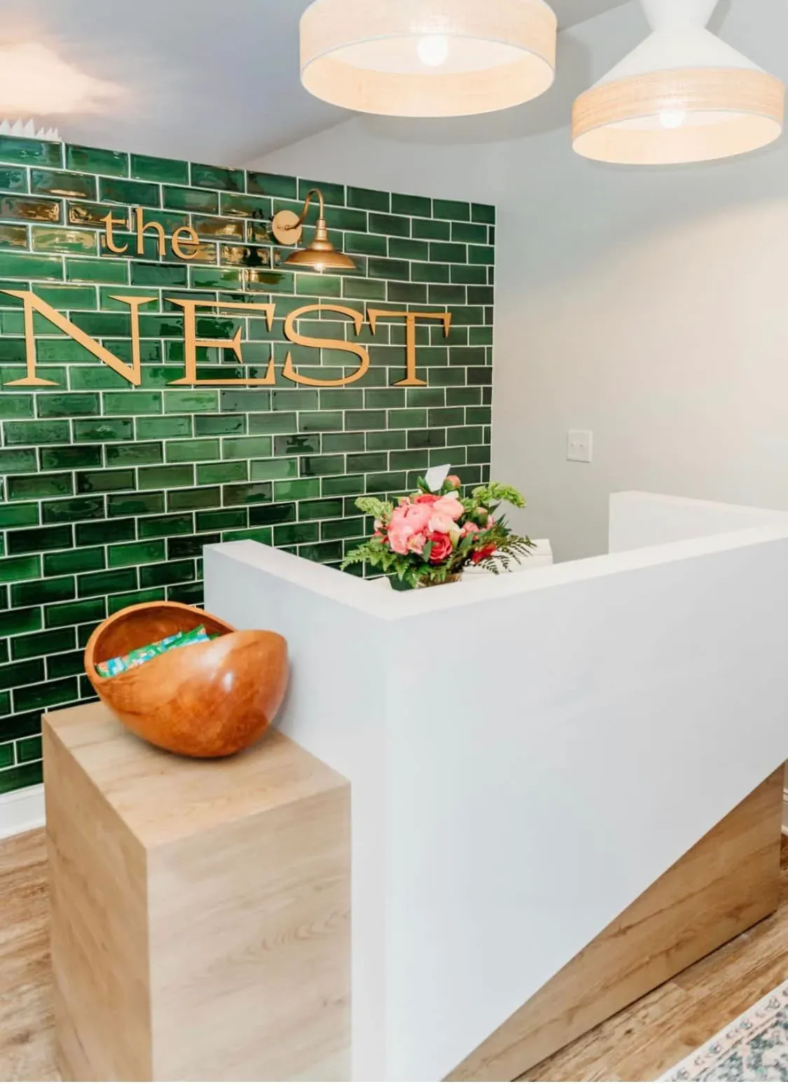 Clean, professional medical spa treatment room with neutral tones at Nest in Russell