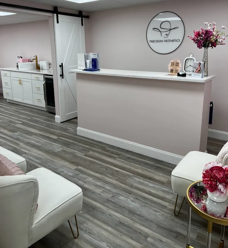 Clean, professional medical spa treatment room with neutral tones at Precision Aesthetics - New Address in Weirton