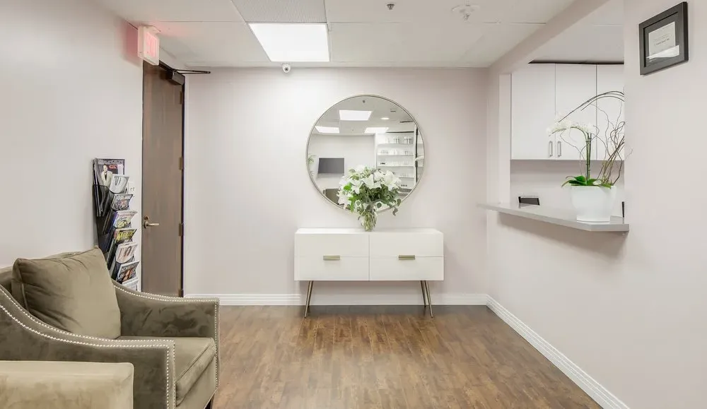Clean, professional medical spa treatment room with neutral tones at T. Joseph Raoof MD, Inc. in Encino