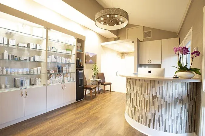 Clean, professional medical spa treatment room with neutral tones at Calabasas Dermatology Center in Calabasas