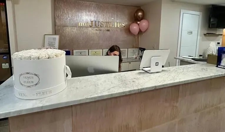 Clean, professional medical spa treatment room with neutral tones at NotJUSTLIPS in New York 