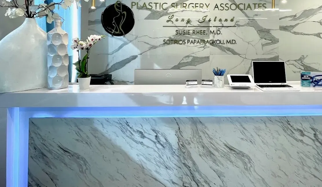 Clean, professional medical spa treatment room with neutral tones at Susie Rhee Plastic Surgery in Roslyn Heights
