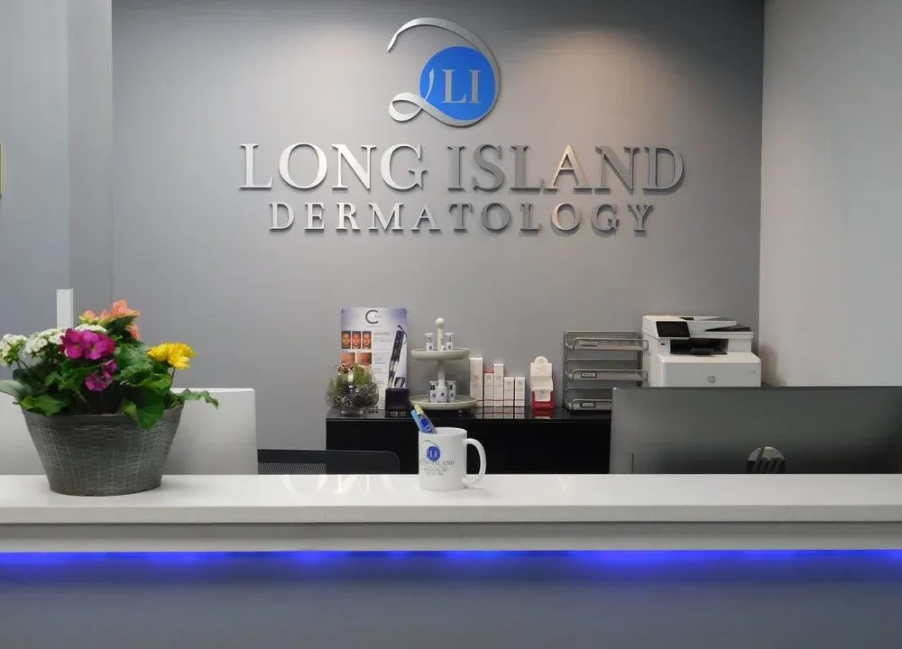 Clean, professional medical spa treatment room with neutral tones at Long Island Dermatology in Manhasset