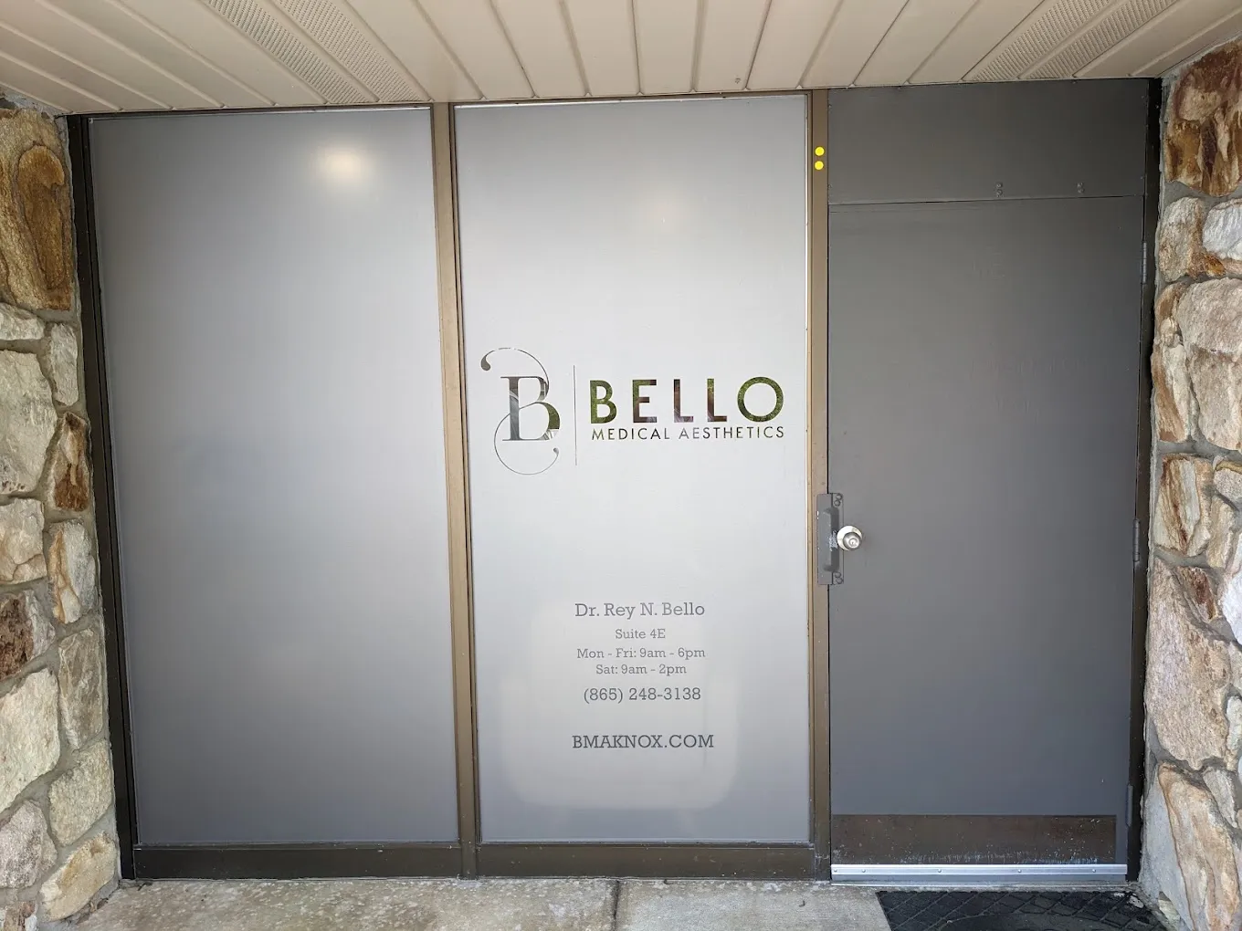 Clean, professional medical spa treatment room with neutral tones at Bello Medical Aesthetics in Knoxville