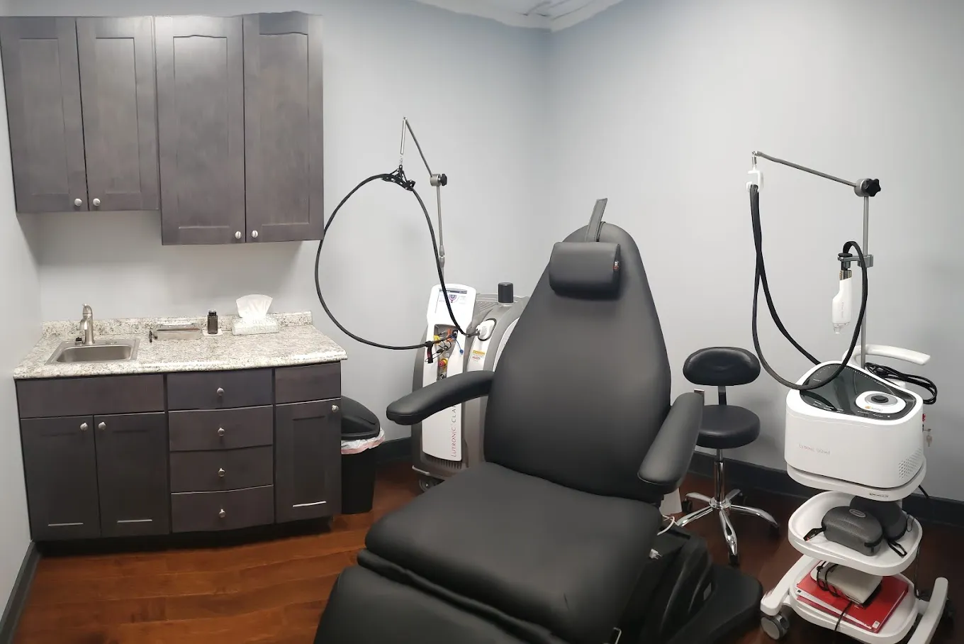 Clean, professional medical spa treatment room with neutral tones at Elite Laser & Skin Care Center in Newark