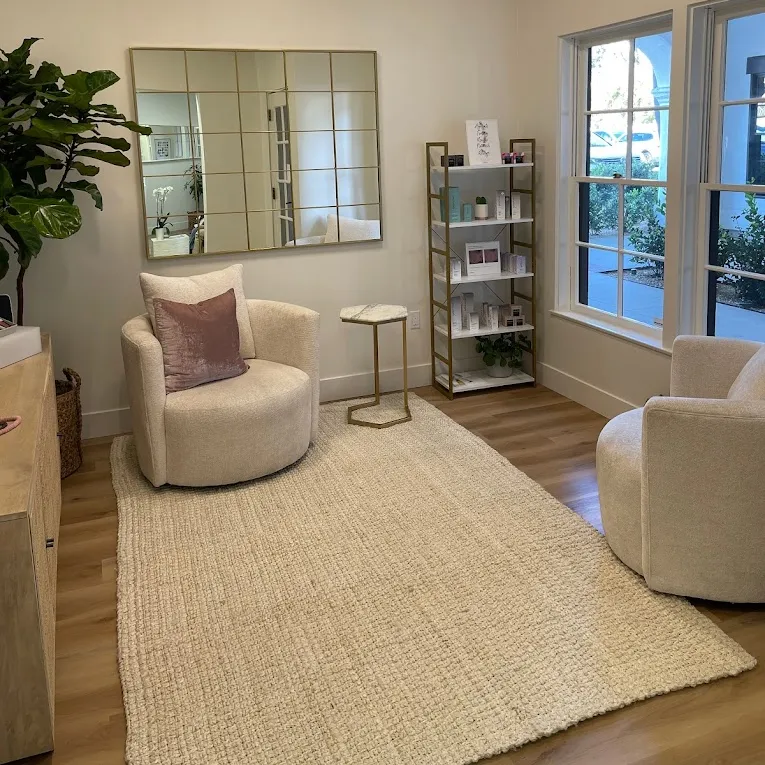 Clean, professional medical spa treatment room with neutral tones at Beauty With A Mission in Costa Mesa