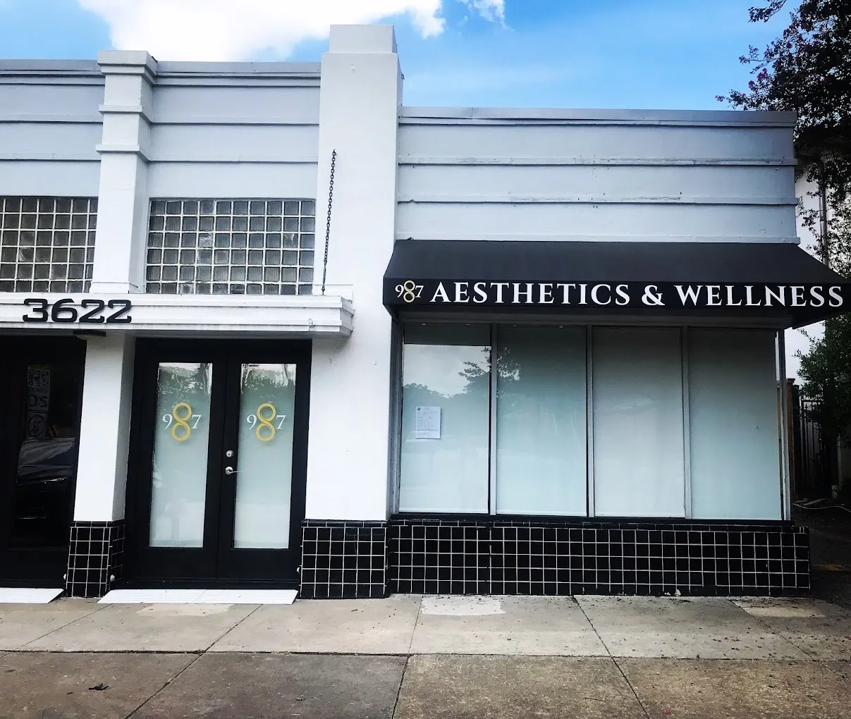 Clean, professional medical spa treatment room with neutral tones at 987 Aesthetics & Wellness in Houston