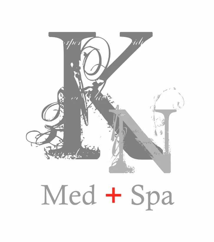 Clean, professional medical spa treatment room with neutral tones at KN Medspa in Natick