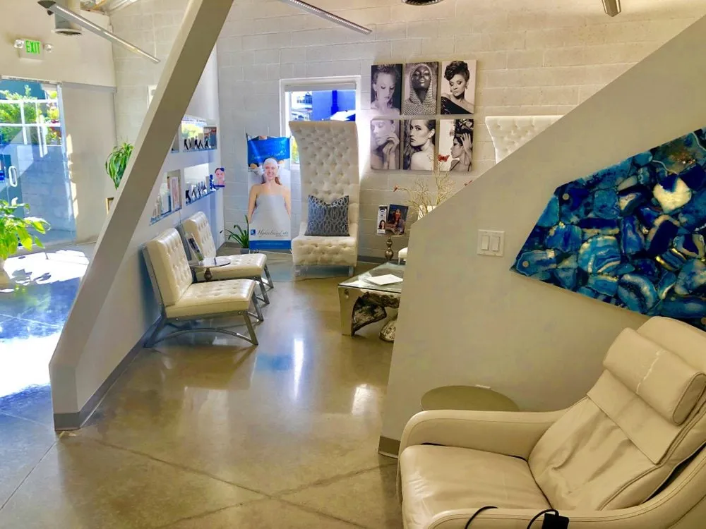 Clean, professional medical spa treatment room with neutral tones at Riviera Laser Studios in Dana Point