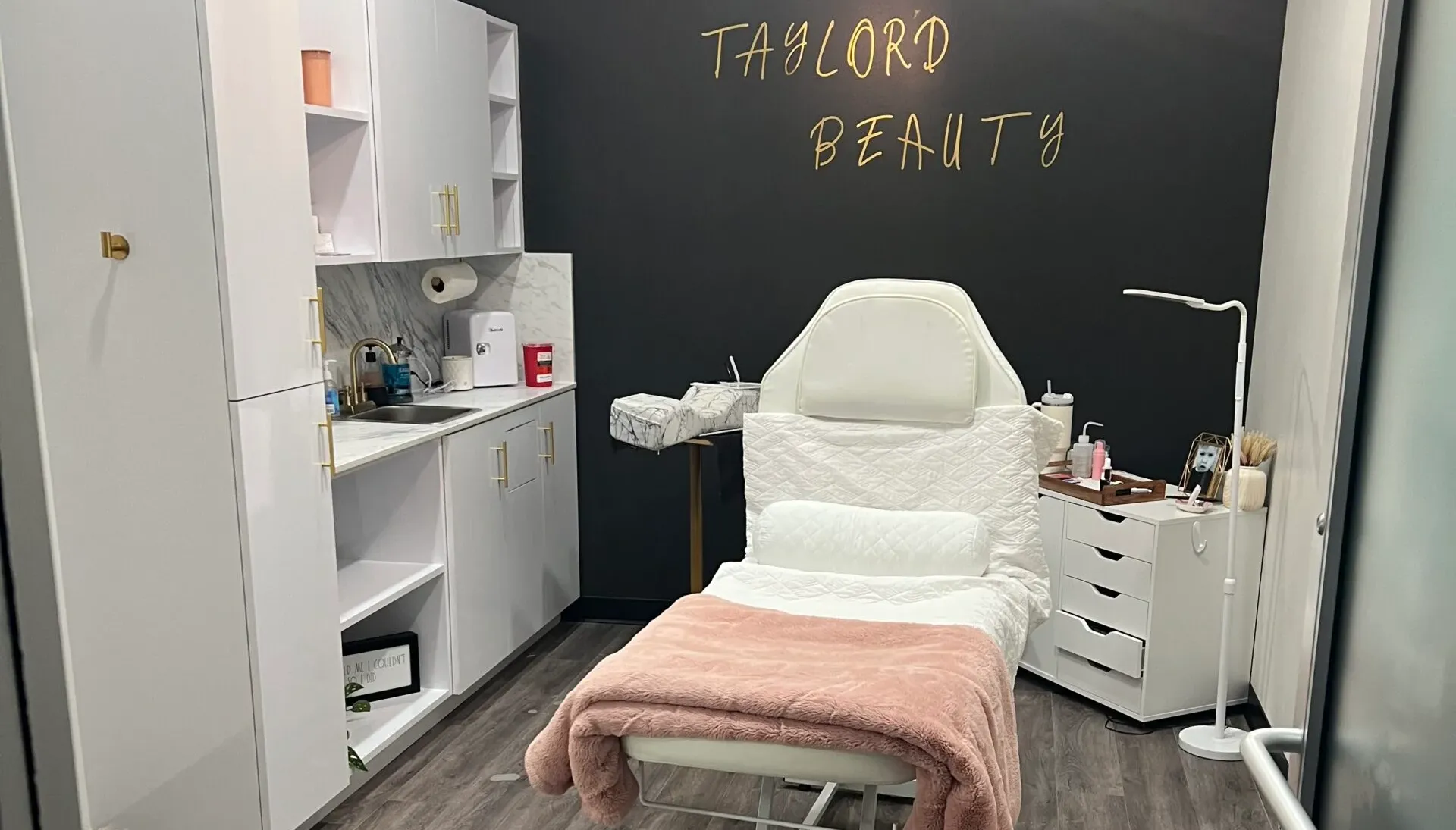 Clean, professional medical spa treatment room with neutral tones at Bellecutis in Fleming Island