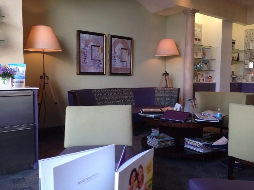 Clean, professional medical spa treatment room with neutral tones at Reviv in Millbrae