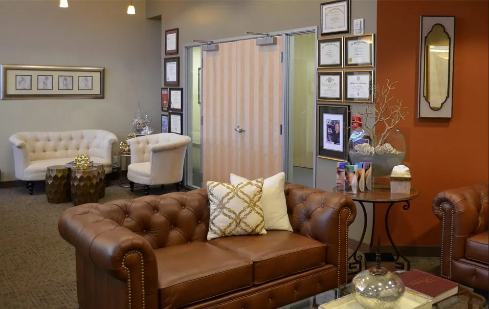 Clean, professional medical spa treatment room with neutral tones at Mofid Plastic Surgery in La Jolla