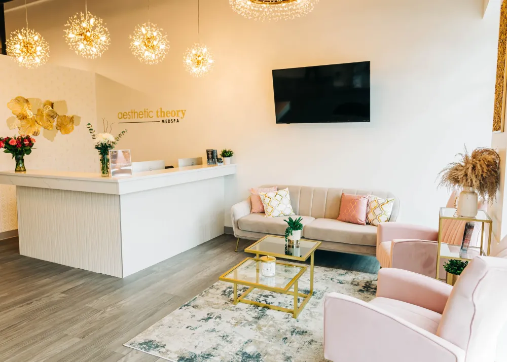 Clean, professional medical spa treatment room with neutral tones at Aesthetic Theory Medspa in Lake Orion