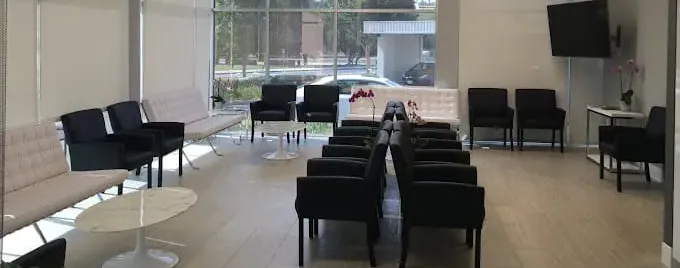 Clean, professional medical spa treatment room with neutral tones at Sheri Rowen, MD in Newport Beach