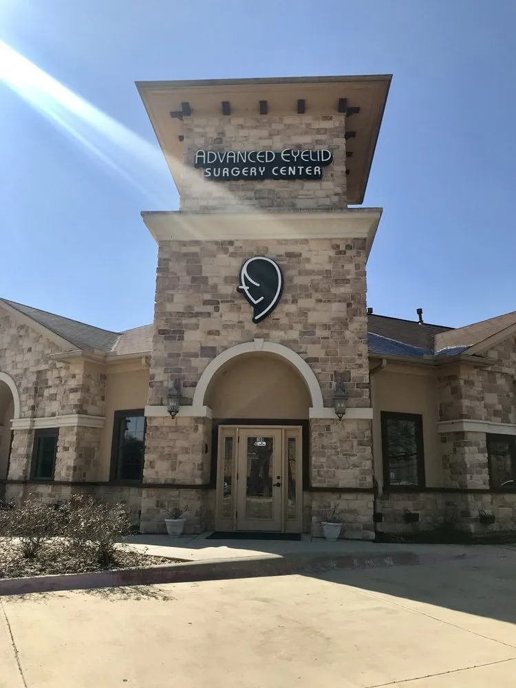 Clean, professional medical spa treatment room with neutral tones at Advanced Eyelid Surgery Center in Colleyville