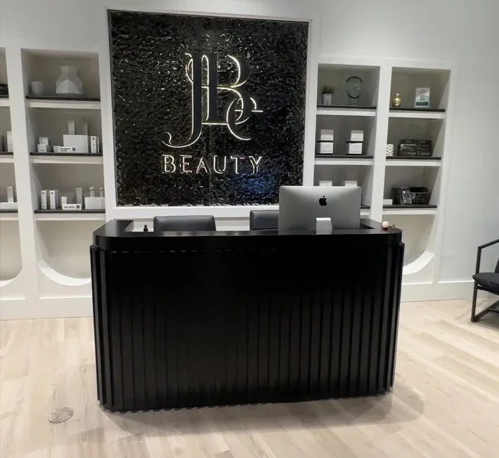 Clean, professional medical spa treatment room with neutral tones at JBe Beauty in Glendale