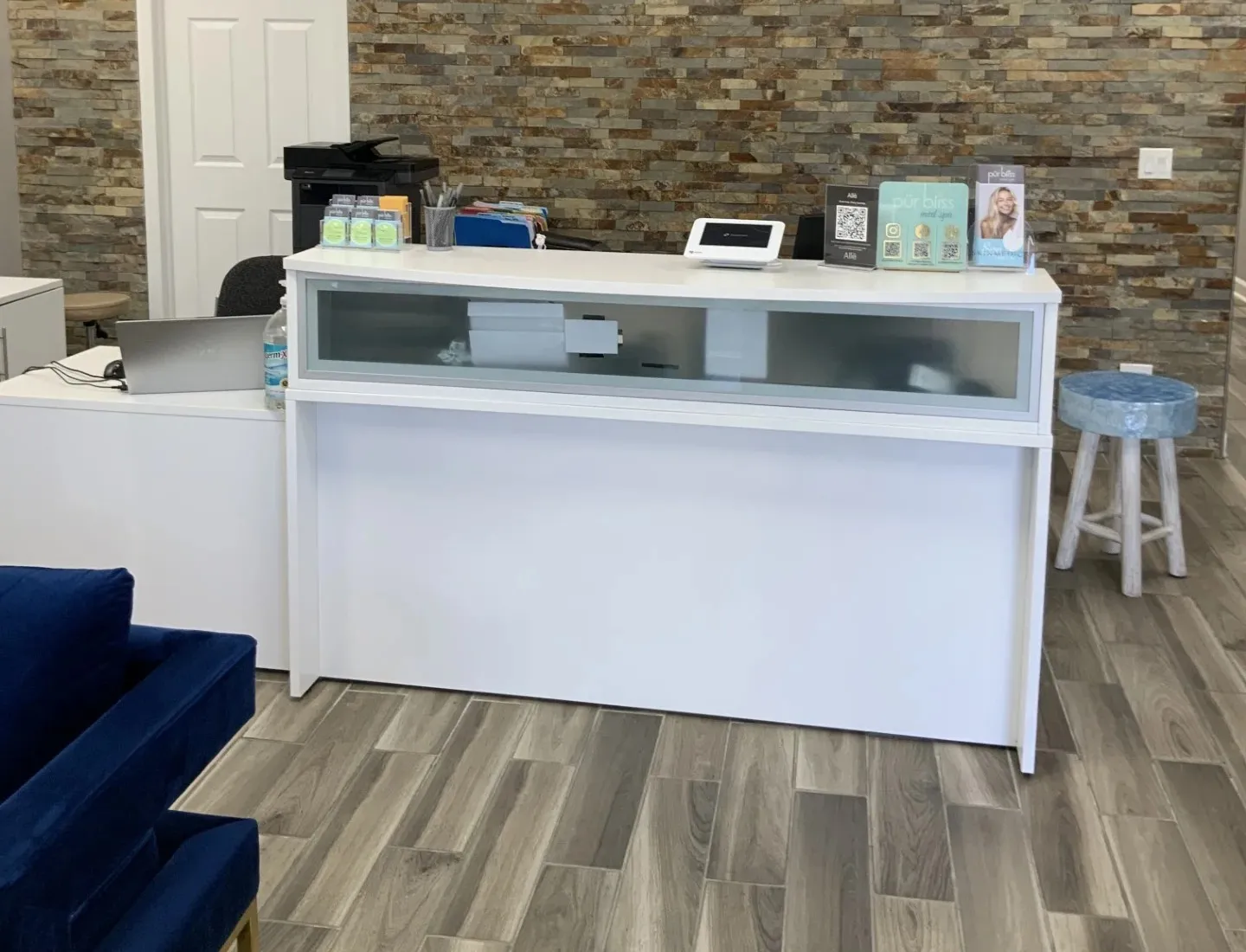 Clean, professional medical spa treatment room with neutral tones at Pur Bliss Med Spa in St. Charles