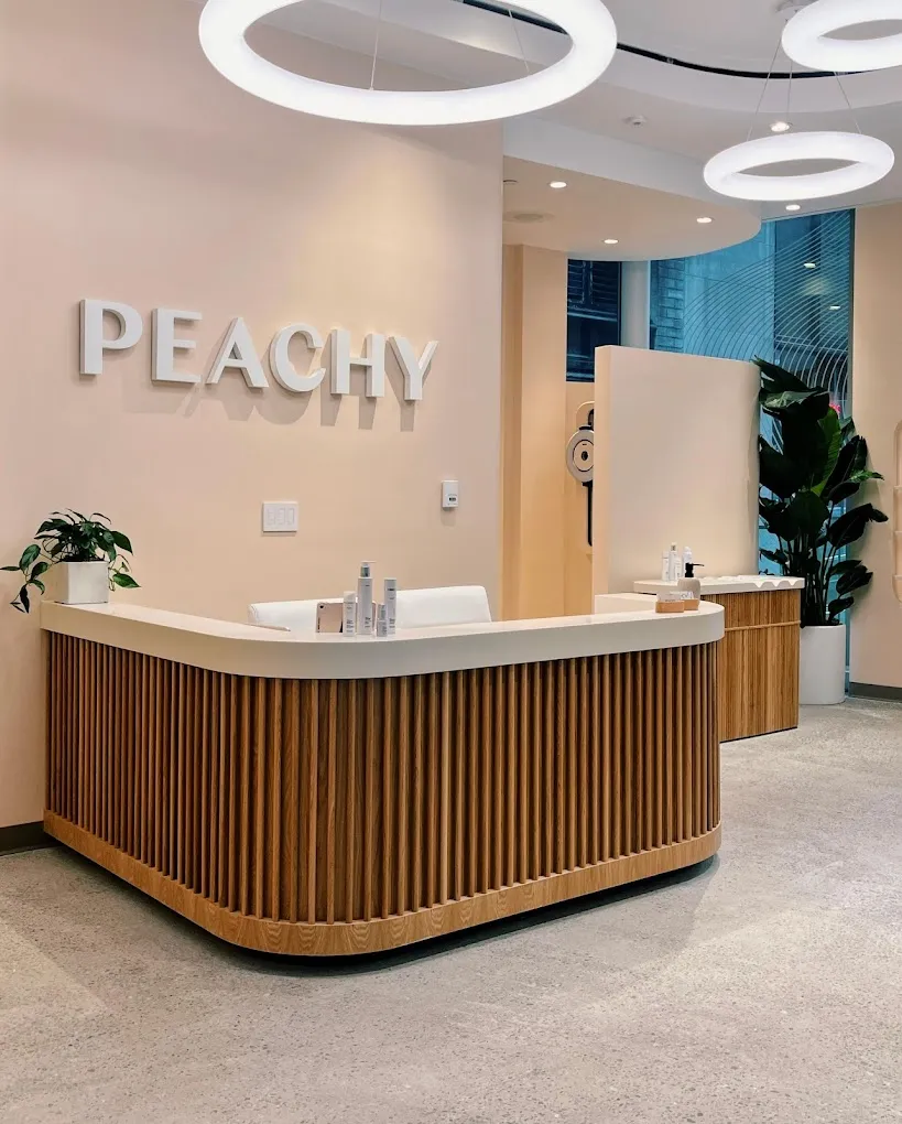 Clean, professional medical spa treatment room with neutral tones at Peachy - Grand Central in New York
