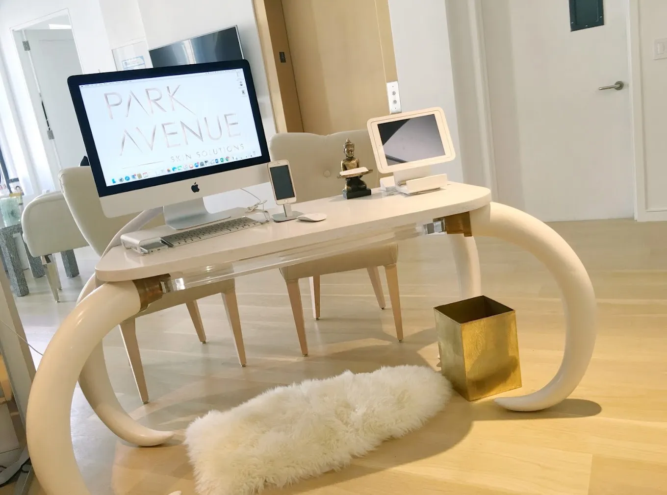 Clean, professional medical spa treatment room with neutral tones at Skin Solution Collective-Flagship 3 in New York
