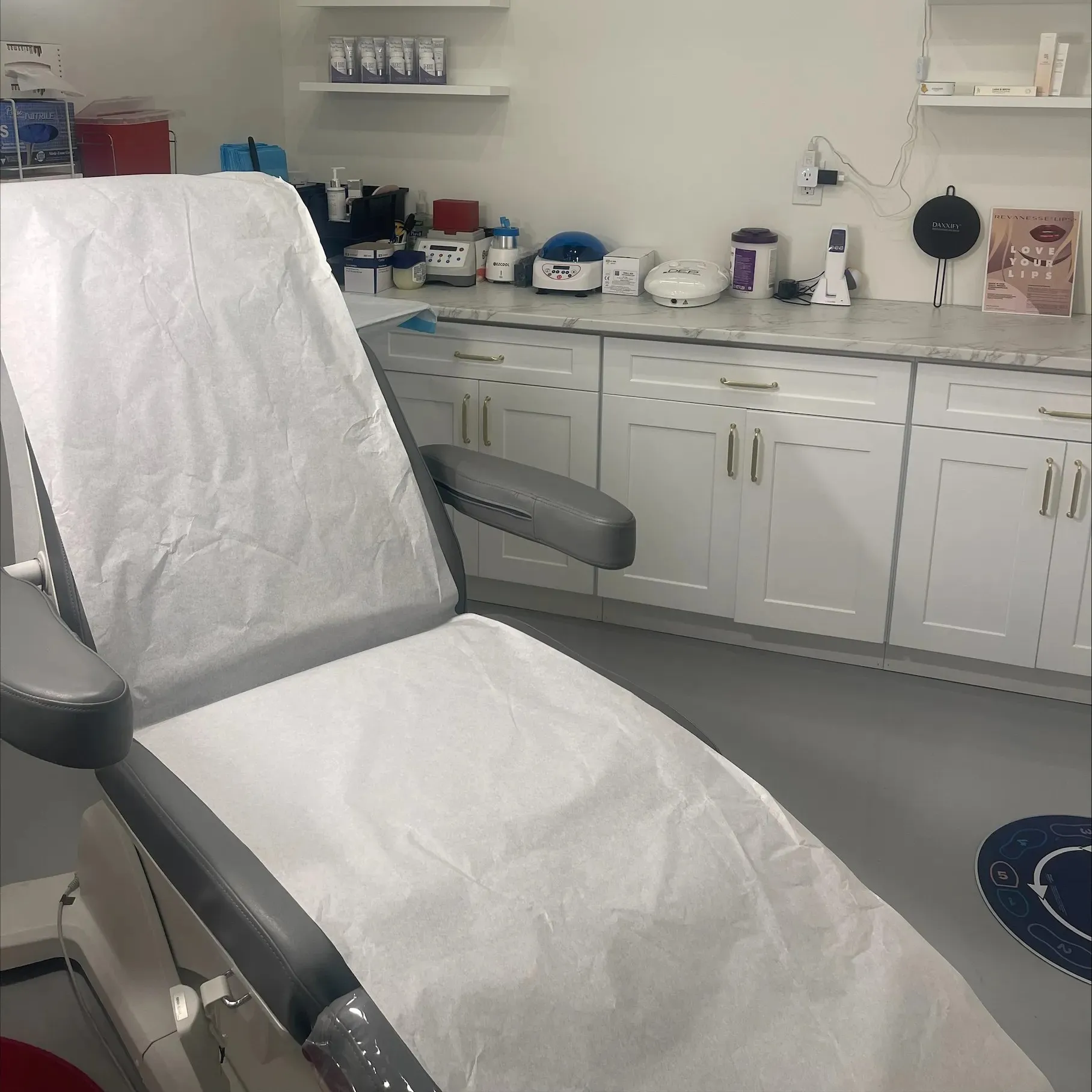 Clean, professional medical spa treatment room with neutral tones at Frances Peredo in Lynbrook