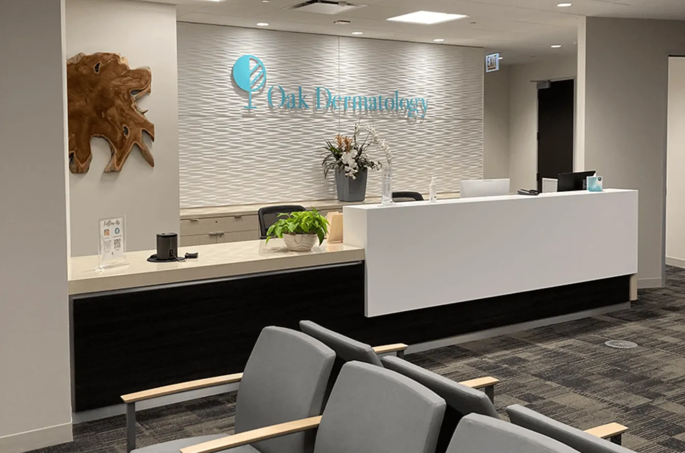 Clean, professional medical spa treatment room with neutral tones at Oak Dermatology in Naperville