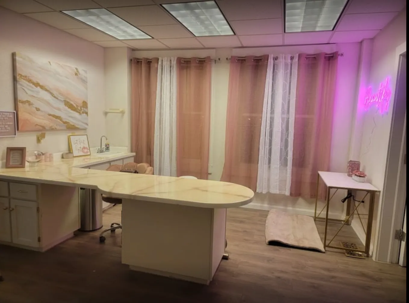 Clean, professional medical spa treatment room with neutral tones at Beautify LLC in Deming