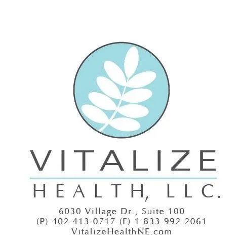 Clean, professional medical spa treatment room with neutral tones at Vitalize Health in Lincoln