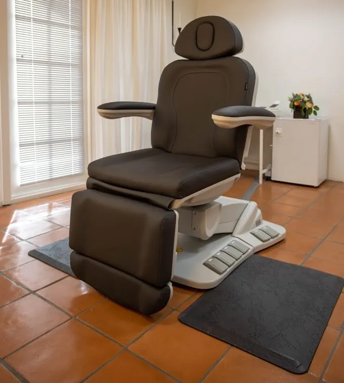 Clean, professional medical spa treatment room with neutral tones at Rise Aesthetics in Phoenix
