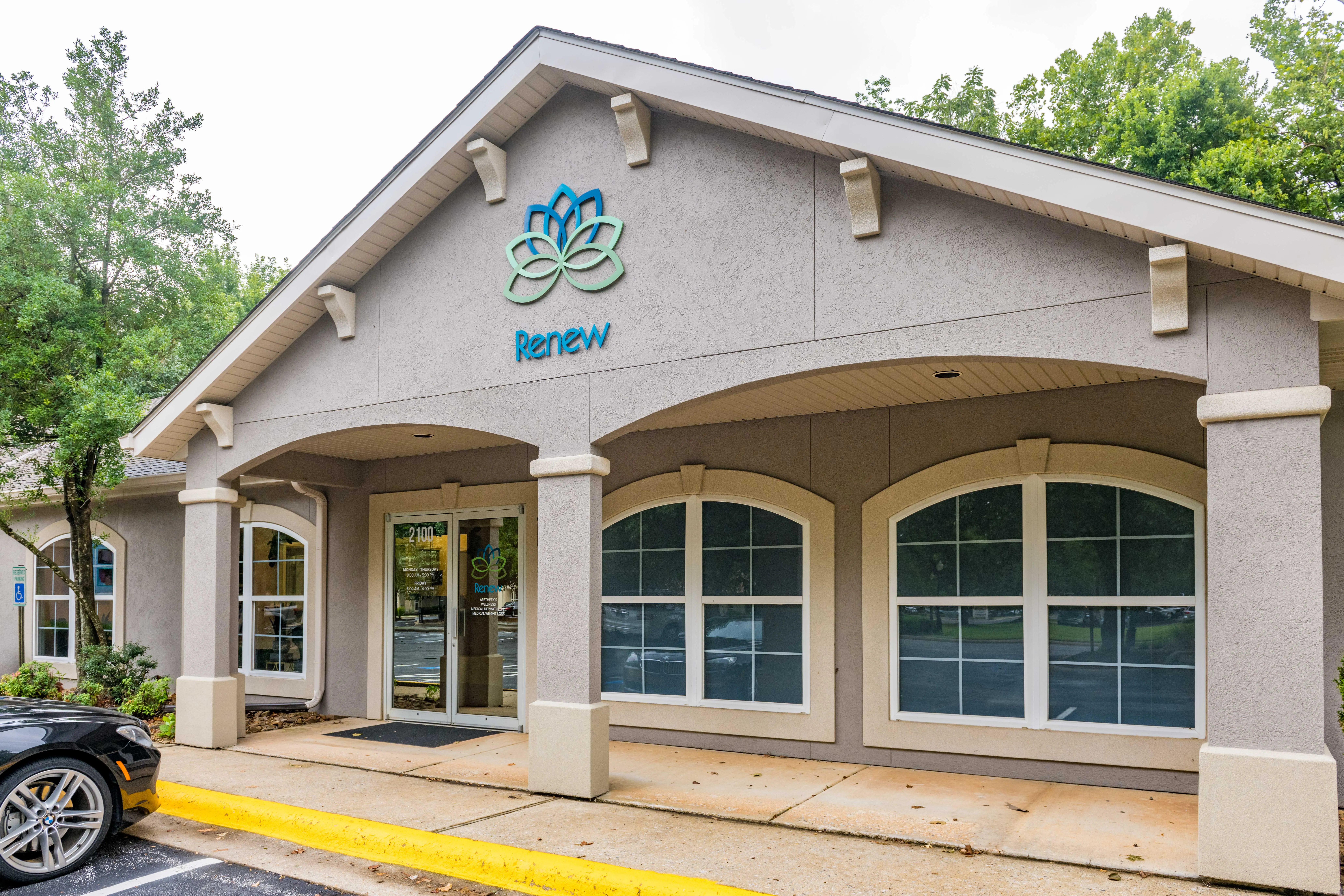 Clean, professional medical spa treatment room with neutral tones at Renew Aesthetics in Rogers