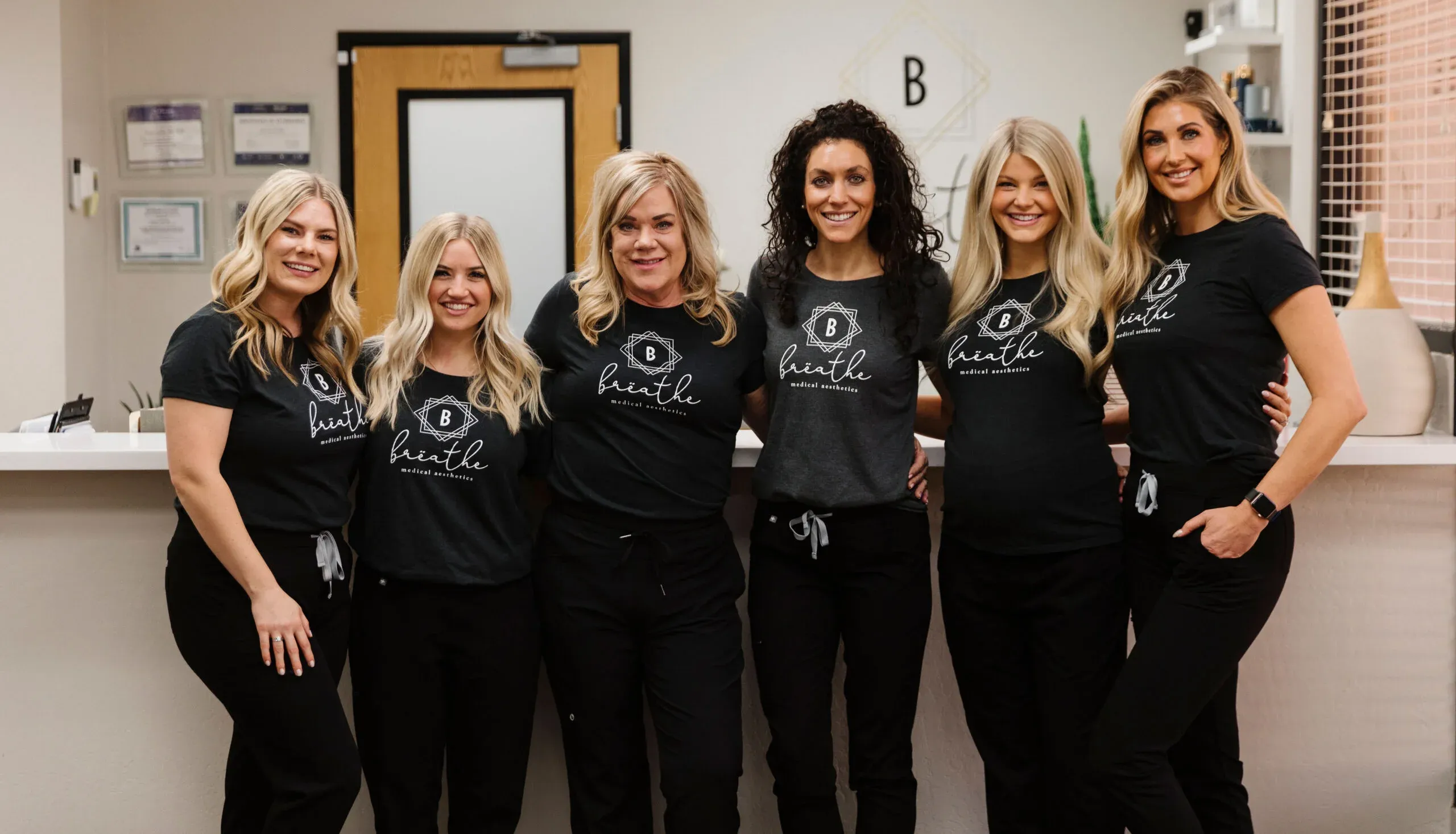Clean, professional medical spa treatment room with neutral tones at Breathe Medical Aesthetics in Chandler