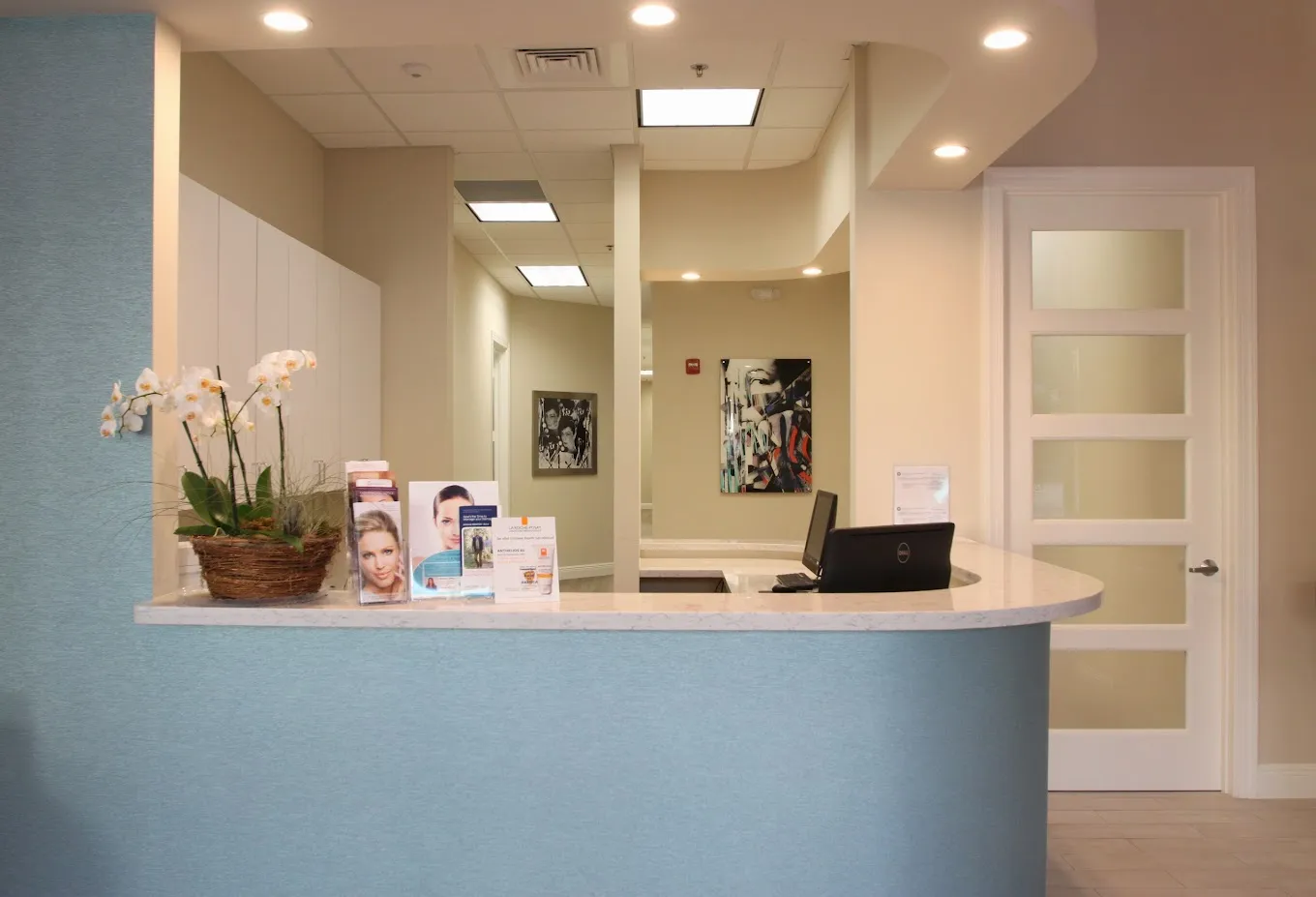 Clean, professional medical spa treatment room with neutral tones at Carroll Dermatology in West Palm Beach