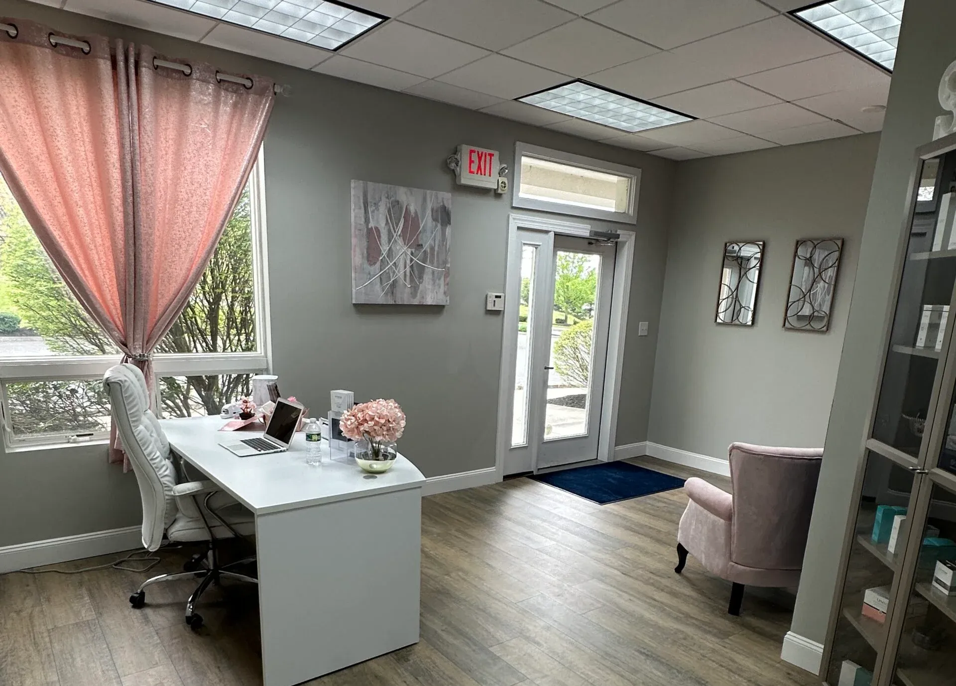 Clean, professional medical spa treatment room with neutral tones at Omorphia Aesthetics in Sewell