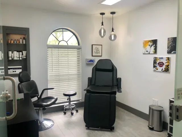 Clean, professional medical spa treatment room with neutral tones at Modern Lady Office in Lake City