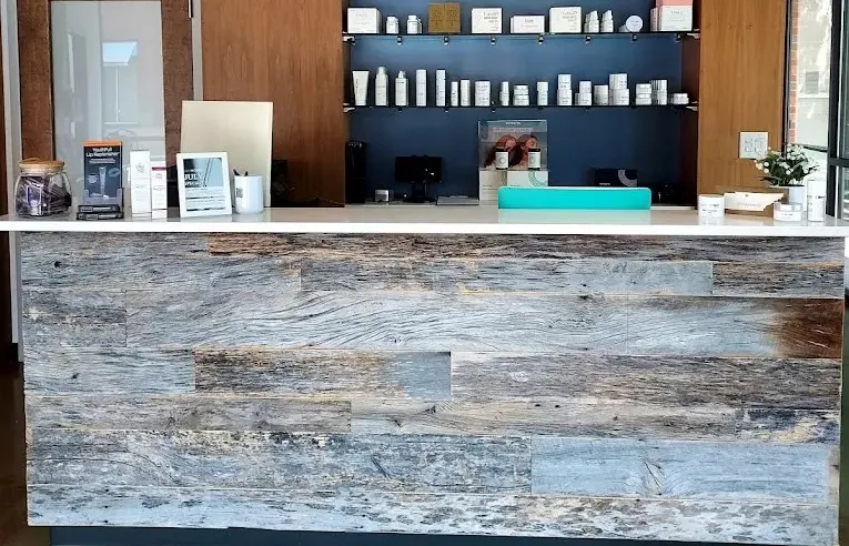 Clean, professional medical spa treatment room with neutral tones at Skinworkswellness in Hendersonville