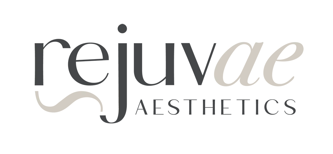 Clean, professional medical spa treatment room with neutral tones at Rejuvae Aesthetics & Wellness, PLLC in Forest Park