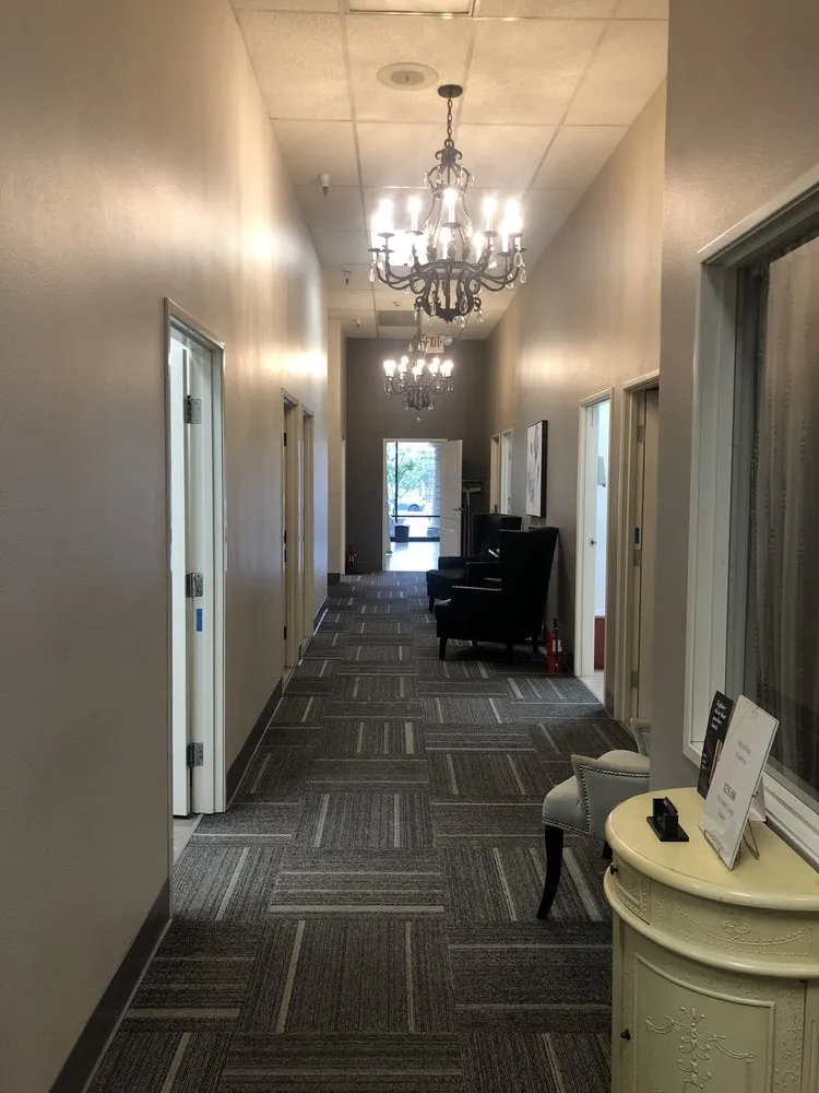 Clean, professional medical spa treatment room with neutral tones at Ajliss - San Dimas in San Dimas