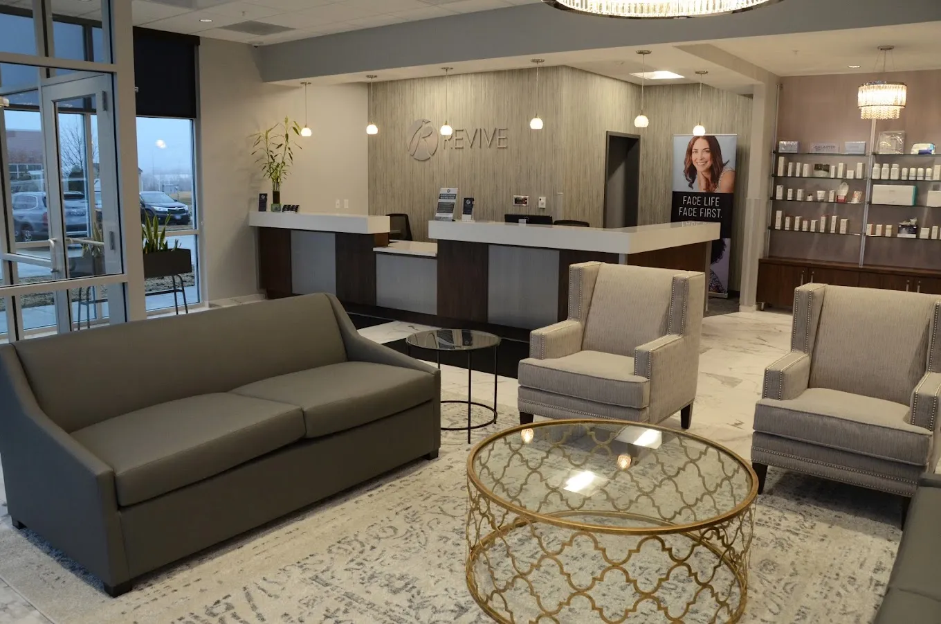 Clean, professional medical spa treatment room with neutral tones at REVIVE AT THE GROUP MED SPA in Davenport